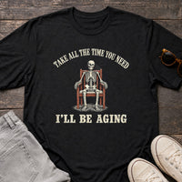Load image into Gallery viewer, Take All The Time You Need I'll Be Aging - Funny Passive Aggressive Skeleton Shirt in Black, props flat