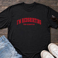Load image into Gallery viewer, I’m Redshirting This Semester - College Student Shirt in Black, props flat